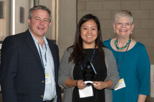 Portrait of awardee April Cha with Chair Continetti and AVC Sawrey